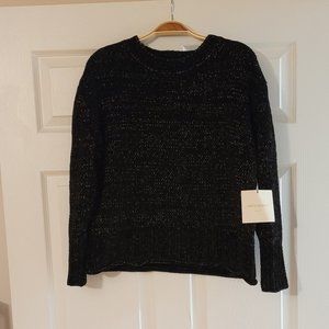 Medium black sweater with gold weaves throughout
